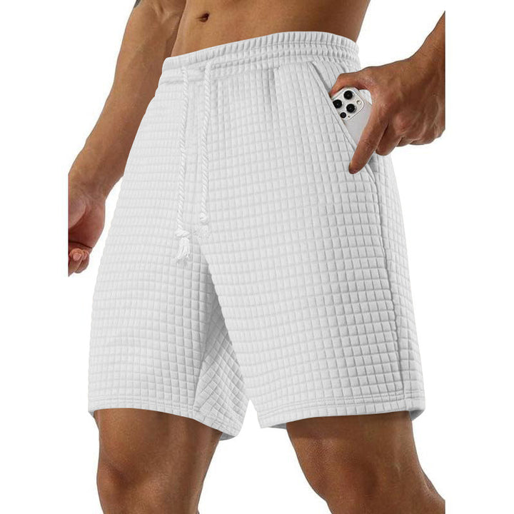 Men's sports shorts in breathable material with practical side pockets Lune London