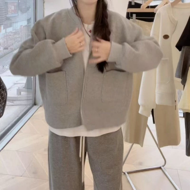 Women's oversized sweat jacket with practical pockets and fashionable design Chic & Stil