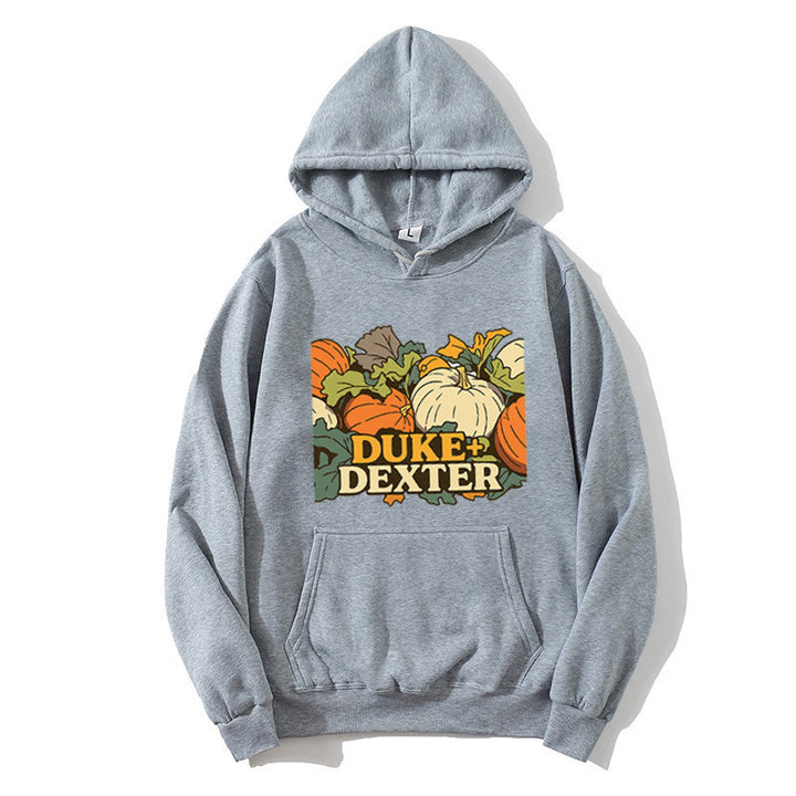 Women's hoodie with cheerful pumpkin motif Chic & Stil