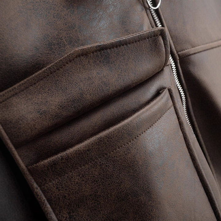 Veste en simili cuir courte pour femmes avec poches à rabat Chic & Stil
