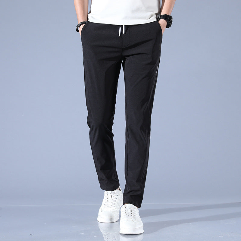 Men's sports pants with adjustable drawstring and zippered pockets on the sides Lune London