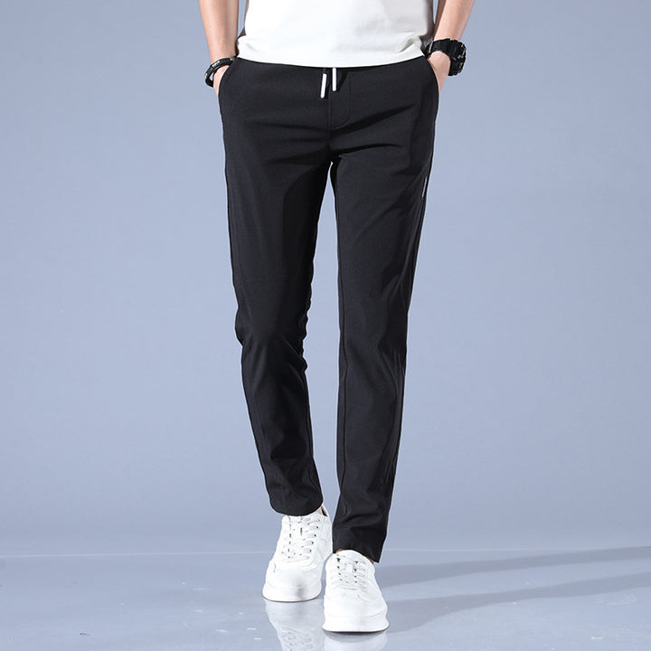 Men's sports pants with adjustable drawstring and zippered pockets on the sides Lune London