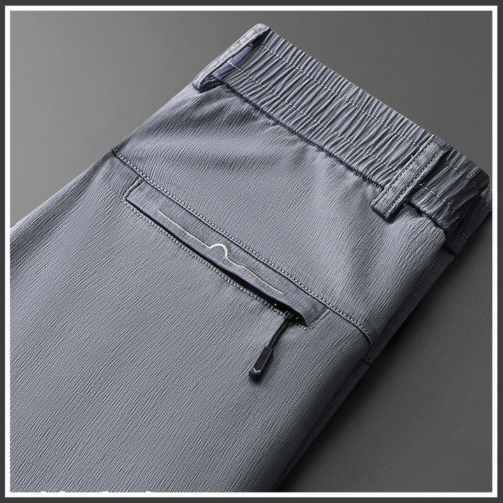 Pantalon stretch confortable pour hommes avec ceinture élastique et poches zippées latérales Lune London