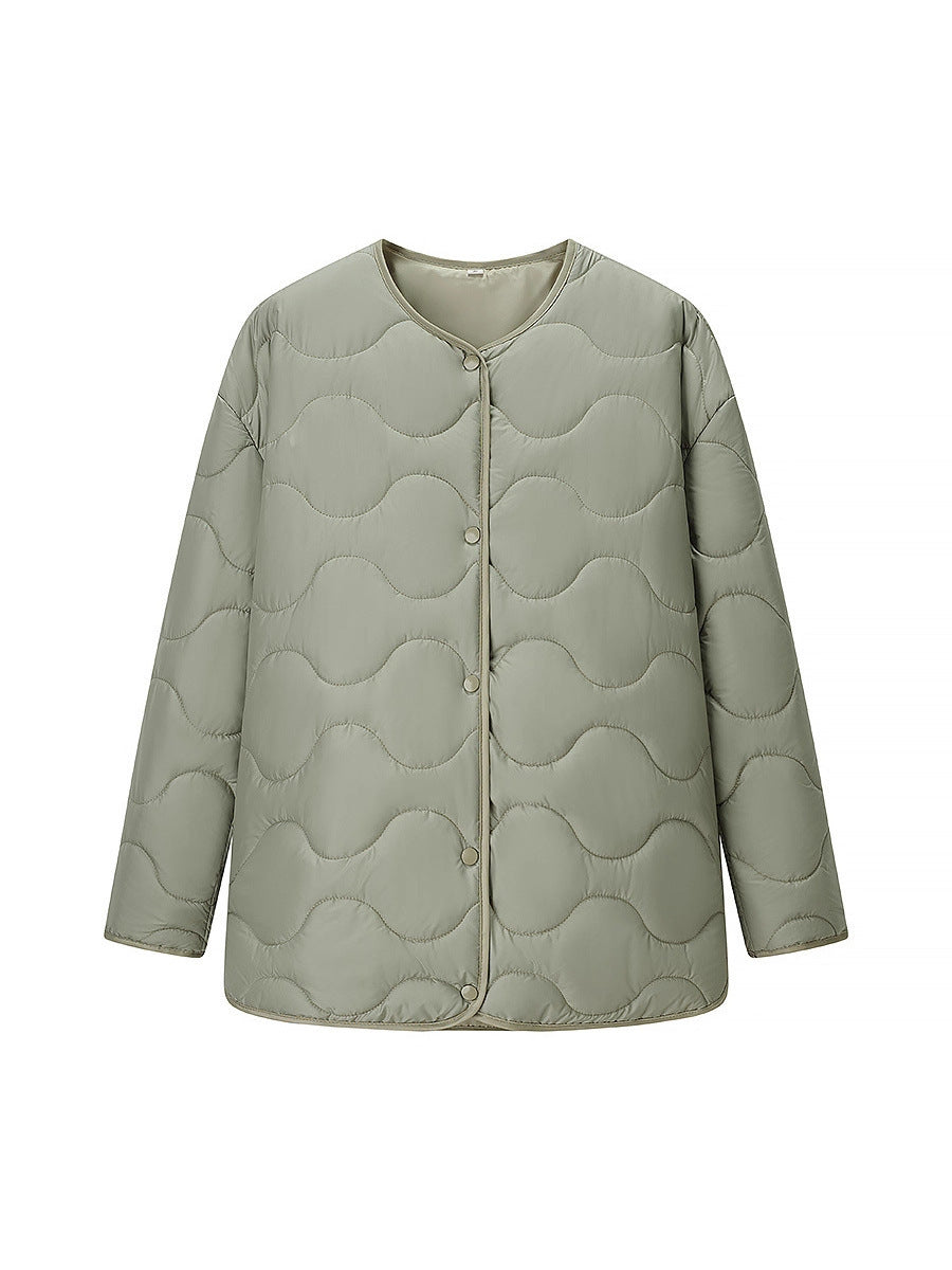 Quilted transition jacket for women with a soft fabric texture and practical snap buttons Lune London