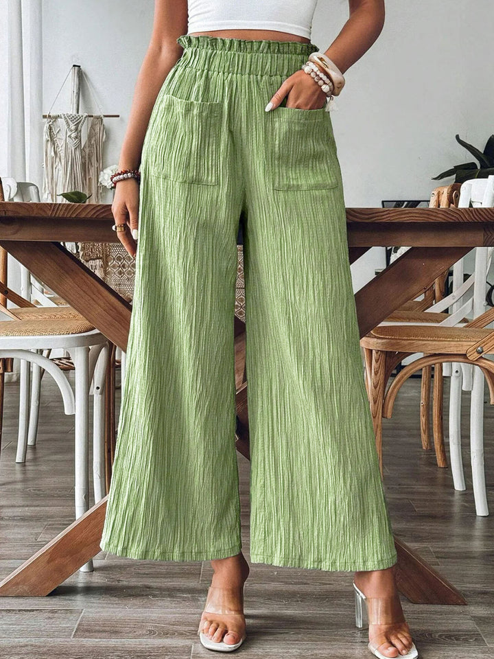 Loose linen pants for women with elastic waist and practical pockets Lune London