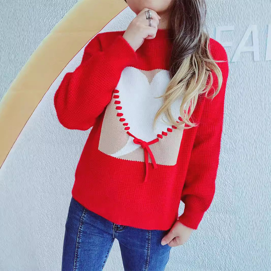 Pull féminin à la mode avec appliqué en forme de cœur et cordon de serrage à l'arrière Chic & Stil