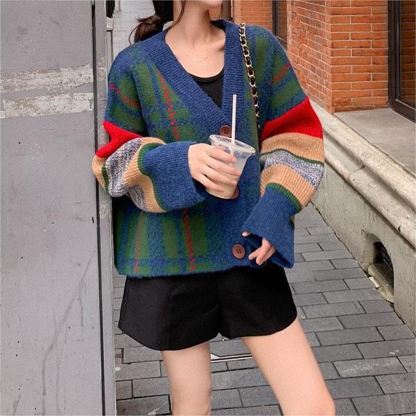 Ladies oversized knitted sweater with colorful checked pattern and large wooden buttons Lune London