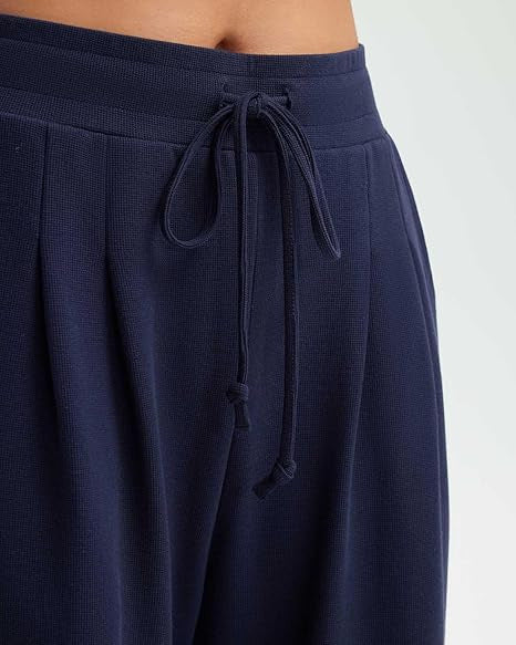 Pantalons décontractés amples pour femmes avec détails en bouton Chic & Stil
