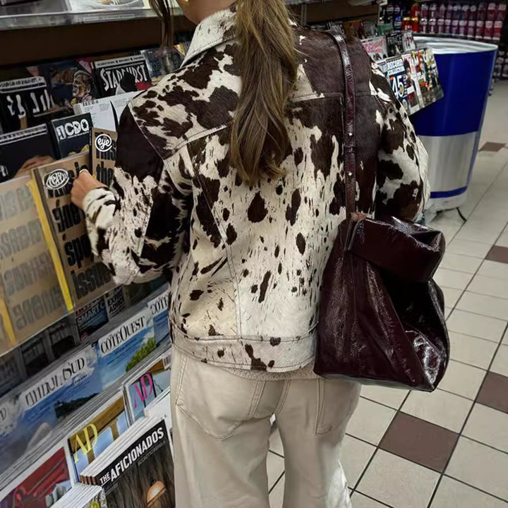 Casual women's denim jacket with cow print and structured accents Lune London