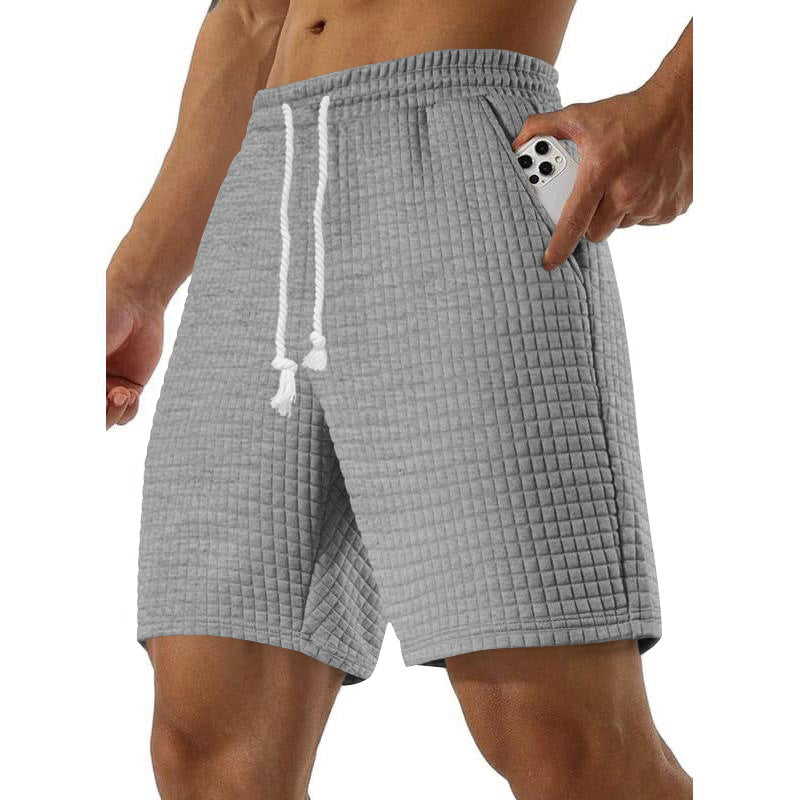 Men's sports shorts in breathable material with practical side pockets Lune London