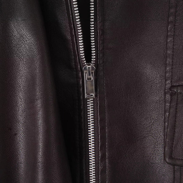 Veste en faux cuir pour femmes au design moderne et aux poches pratiques Chic & Stil