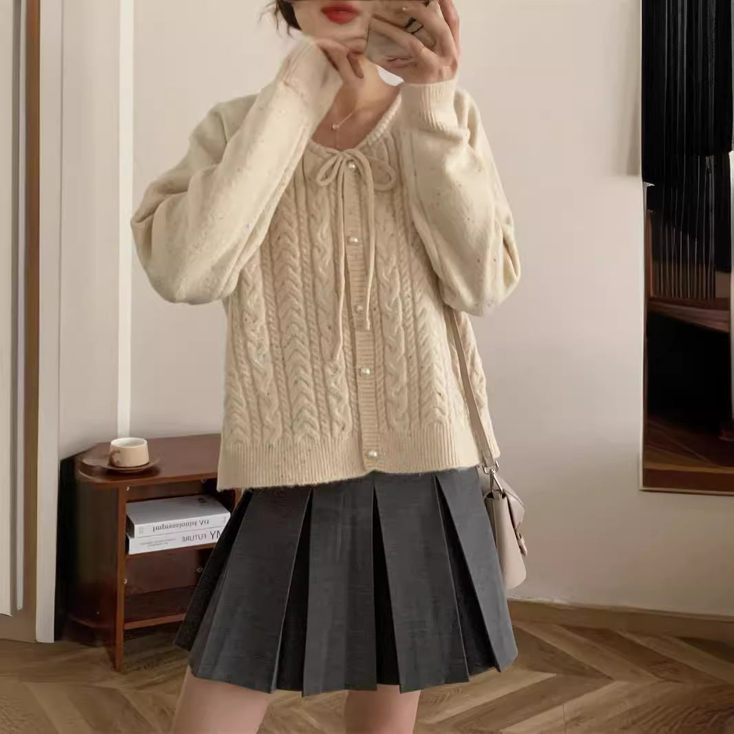 Chunky knit jacket for women with elegant pearl buttons and a structured design Lune London