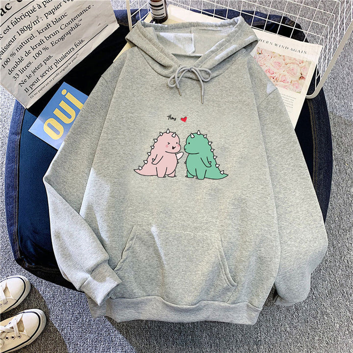 Women’s hoodie with playful dinosaur motif Chic & Stil