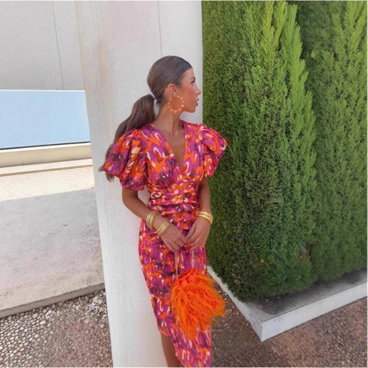 Midi dress for women with exciting puffed sleeves and a deep V-neck Lune London