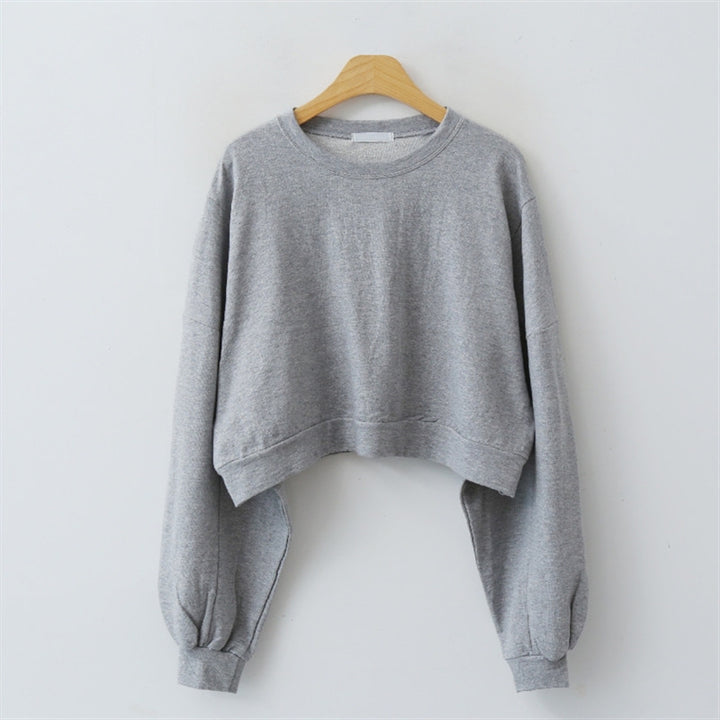 Pull court pour femmes avec manches ballon Chic & Stil