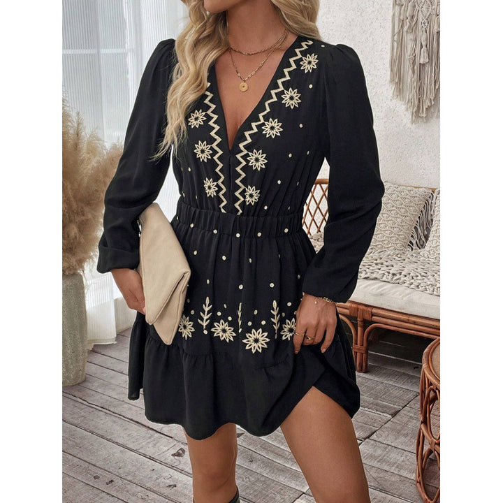 Mini dress for women with floral embroidery detail and waist belt Lune London