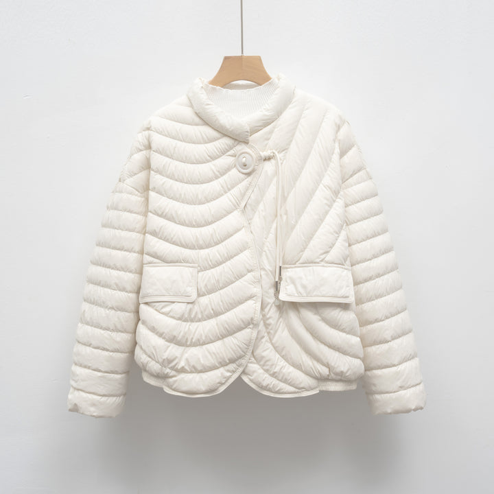Trendy quilted jacket for women with asymmetrical cut and practical pockets Lune London