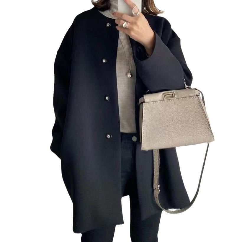 Ladies Elegant Oversized Wool Coat with Double Button Closure and Side Pockets Lune London