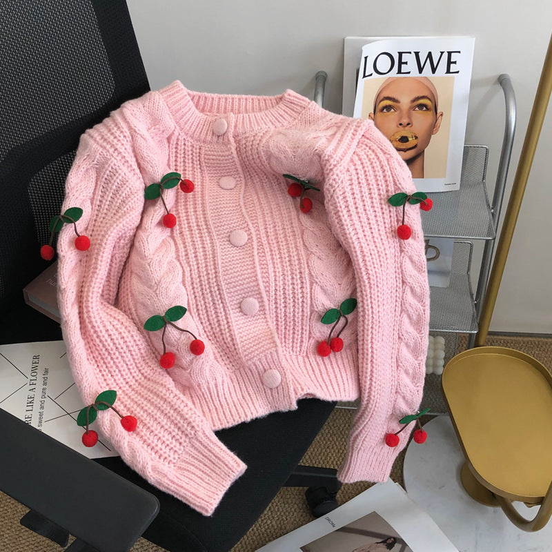 Women's chunky knit sweater with floral appliqués and button details Lune London