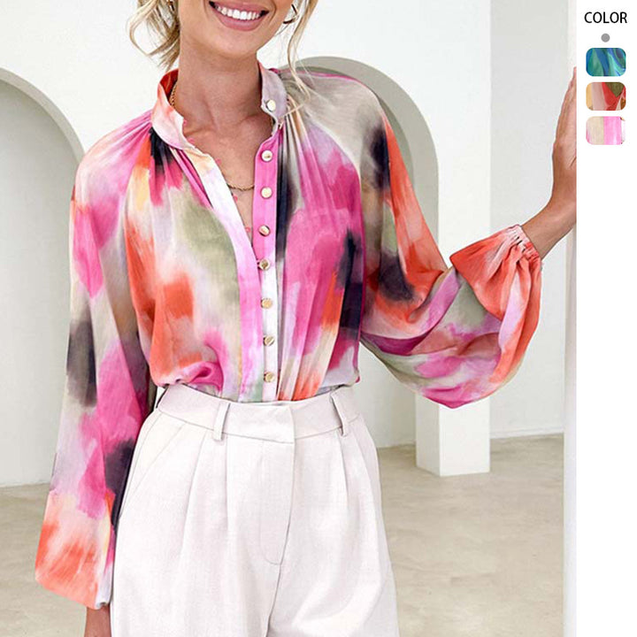 Women's blouse with a loose fit and elegant puff sleeves Chic & Stil