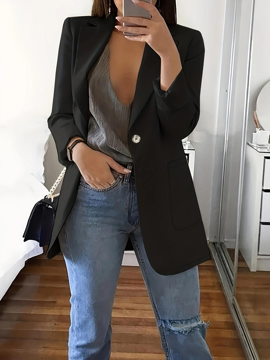 Elegant women's jacket with a deep V neckline and practical pockets Lune London