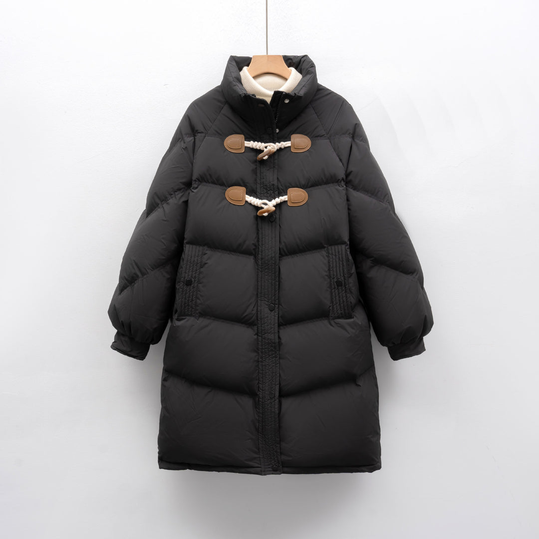 Elegant long coat for women with integrated buttons and a voluminous cut Lune London