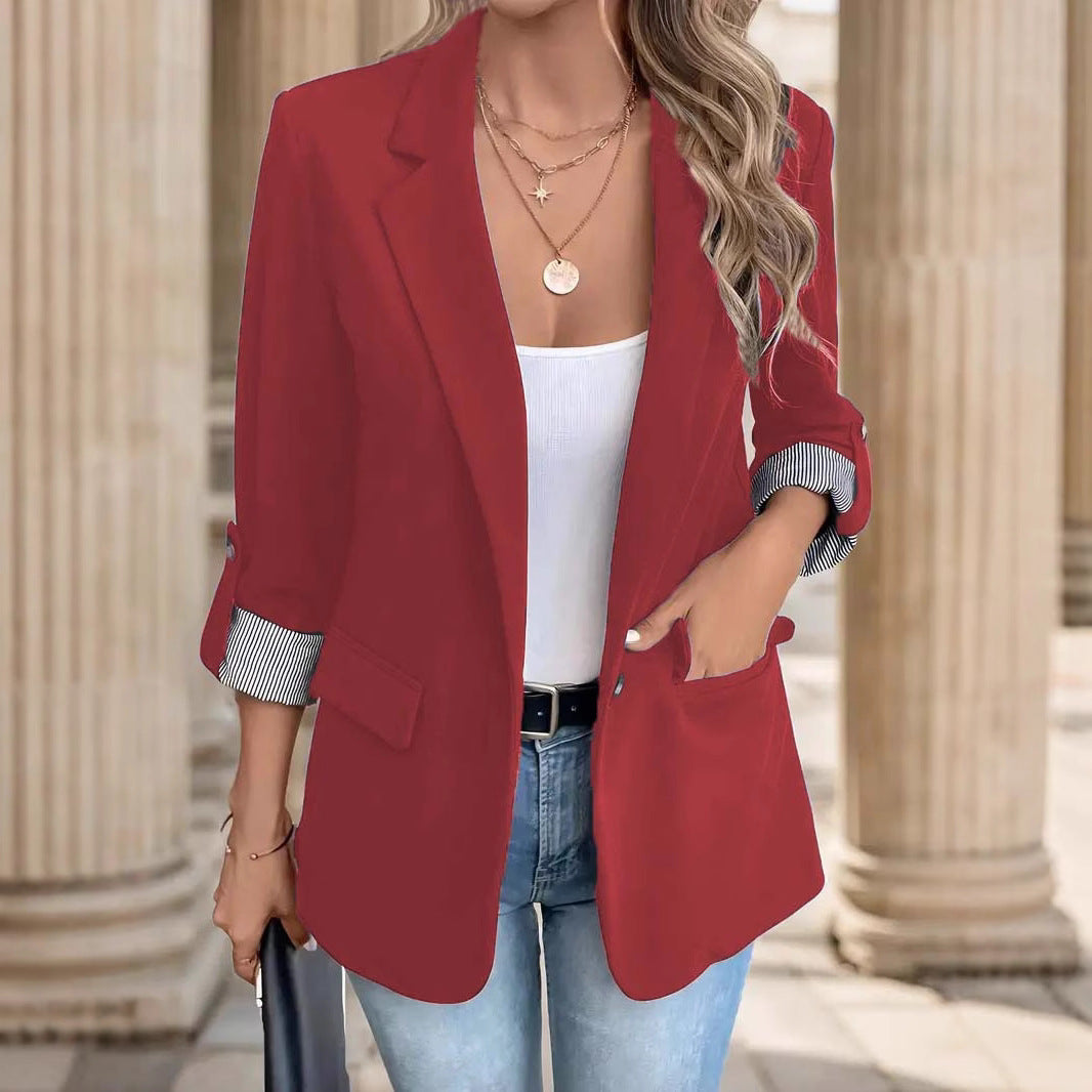 Trendy women's blazer jacket with elegant button details and striped sleeves Lune London