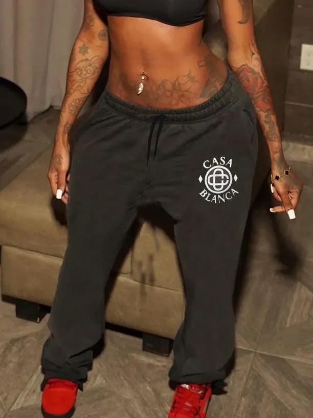 Elegant sports pants for women with decorative logo Lune London