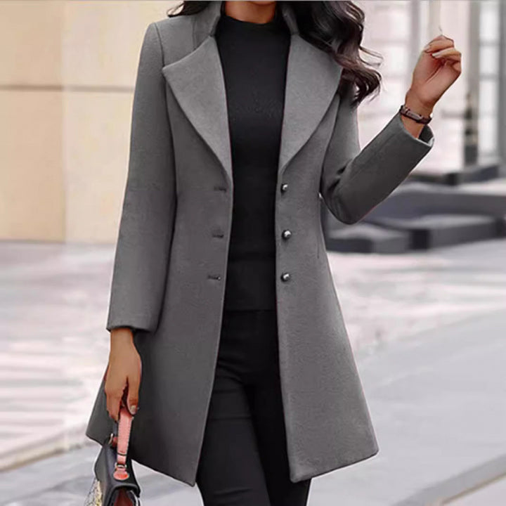 Elegant wool coat for women with a structured cut and a double-button design.