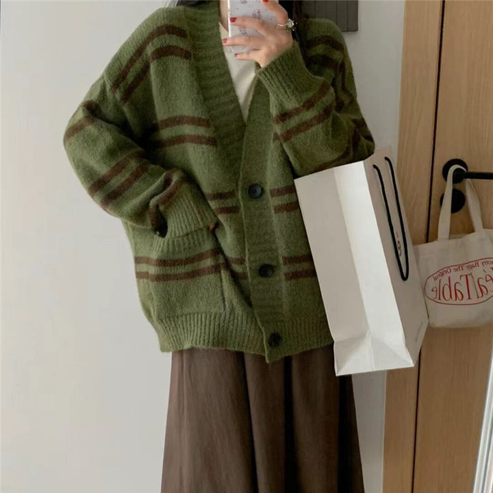 Chunky knit cardigan for women with wide lapels and decorative button details Lune London