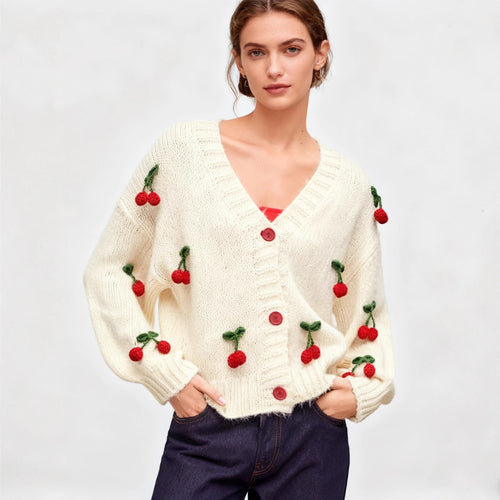 Knitted jacket for women with a cheerful cherry design and practical button details Lune London