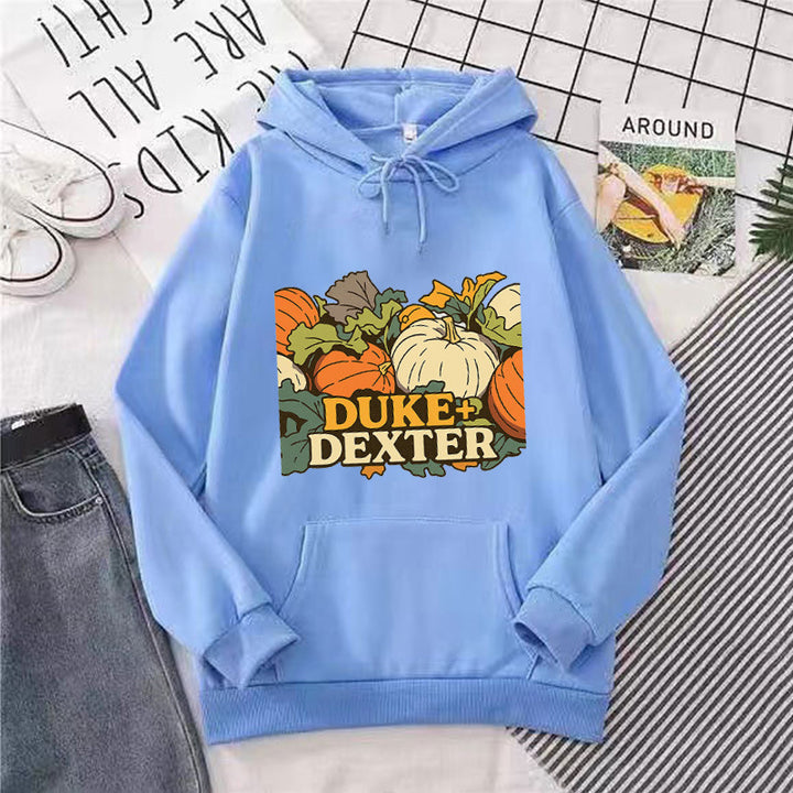 Women's hoodie with cheerful pumpkin motif Chic & Stil