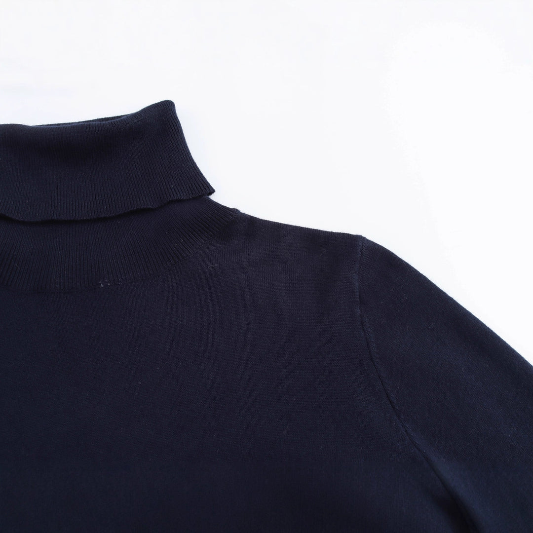 Ladies' turtleneck sweater with elegant button details Lune London