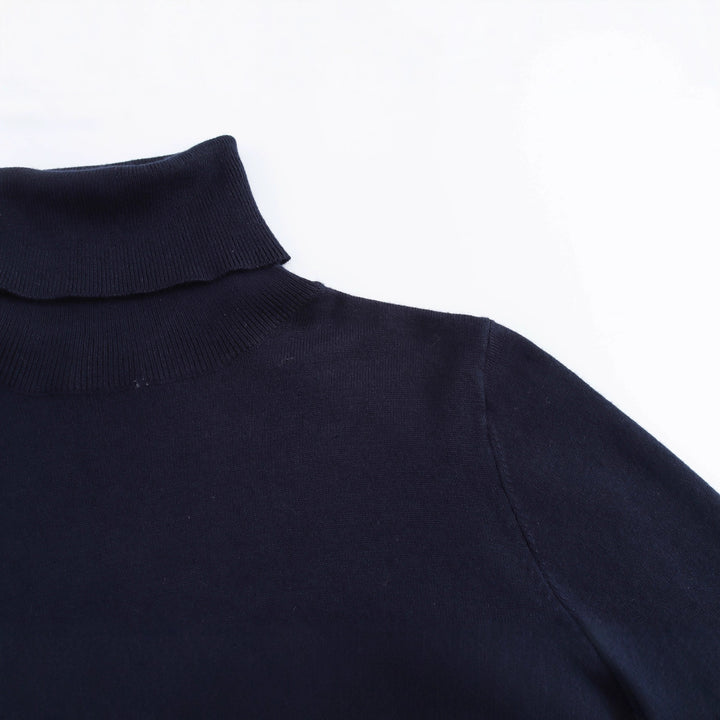 Ladies' turtleneck sweater with elegant button details Lune London