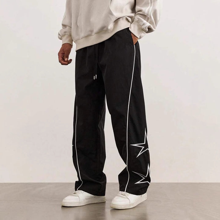 Sport leisure pants for men with chic and stylish side appliqués