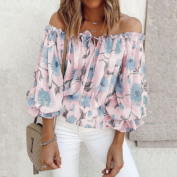 Romantic blouse for women with floral pattern and ruffled sleeves Lune London