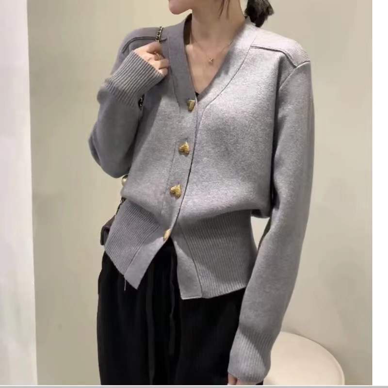 Ladies Elegant Knit Vest with Decorative Button Details and Chic V Neck