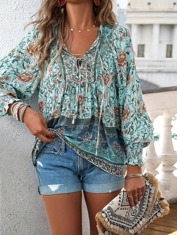 Lightweight women's blouse with a refined floral design and a relaxed fit Lune London