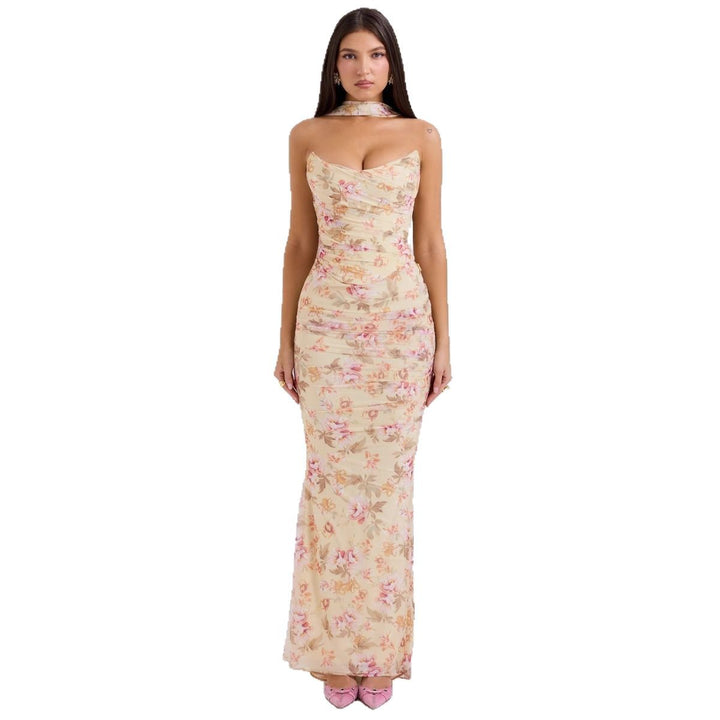 Women's form-fitting evening dress with off-shoulder design and sophisticated draping Lune London