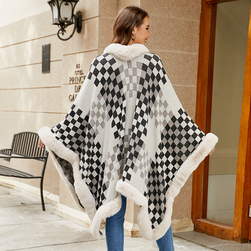 Elegant knitted poncho for women with luxurious faux fur insert and geometric pattern Lune London