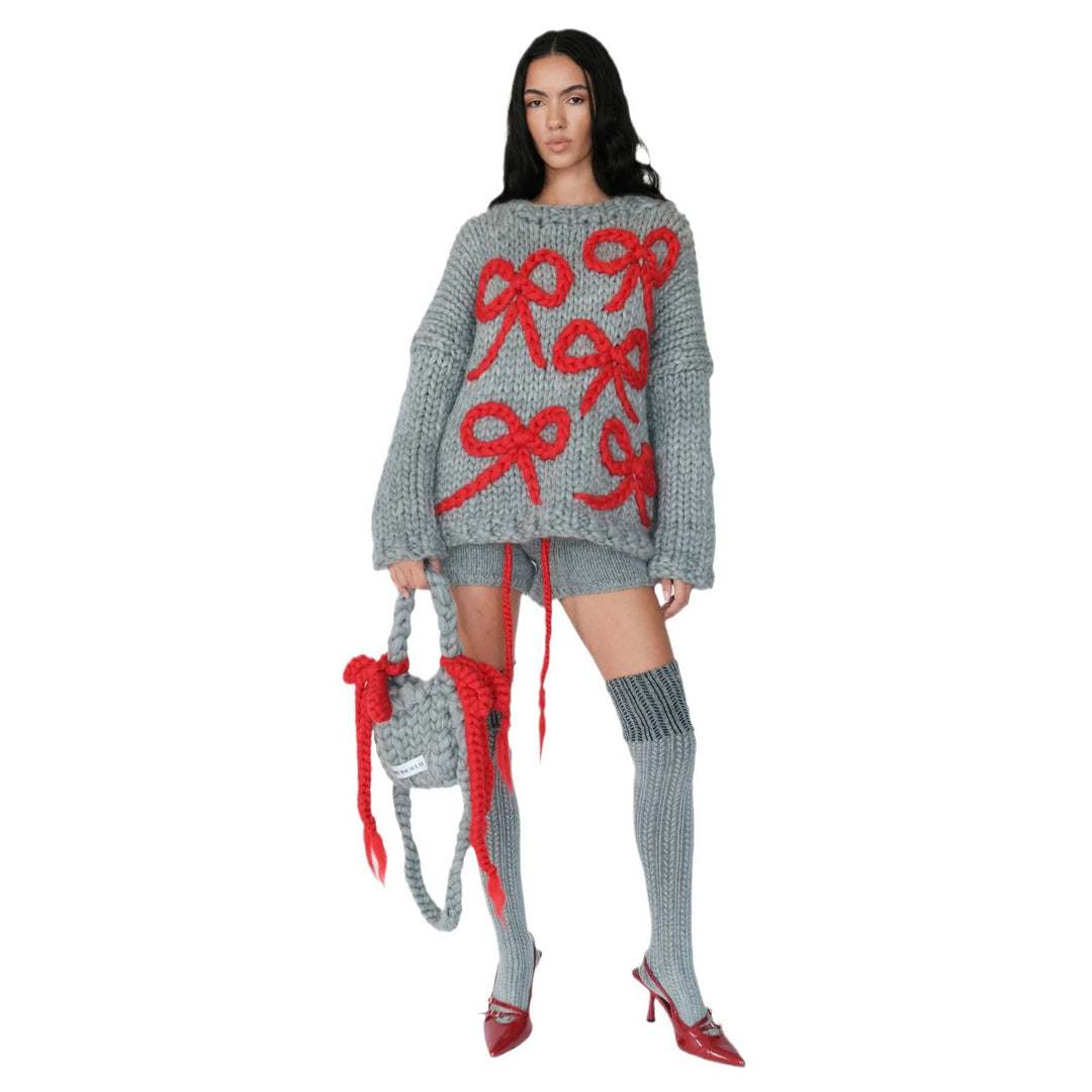 Chunky knit sweater for women with a playful knot design Lune London