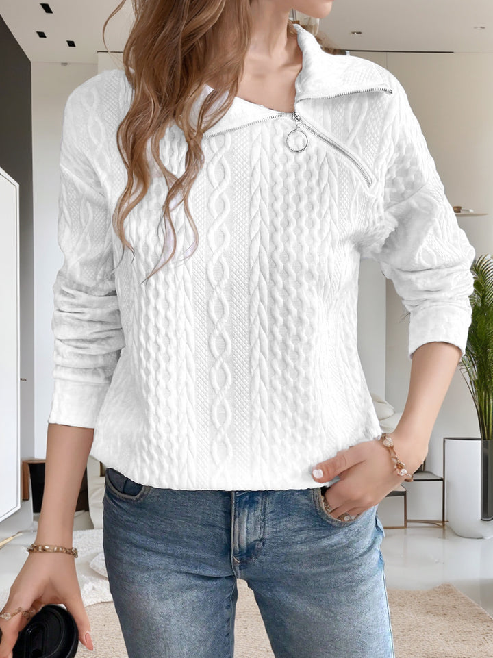Casual knitted women's sweater with short zipper and textured surface Lune London