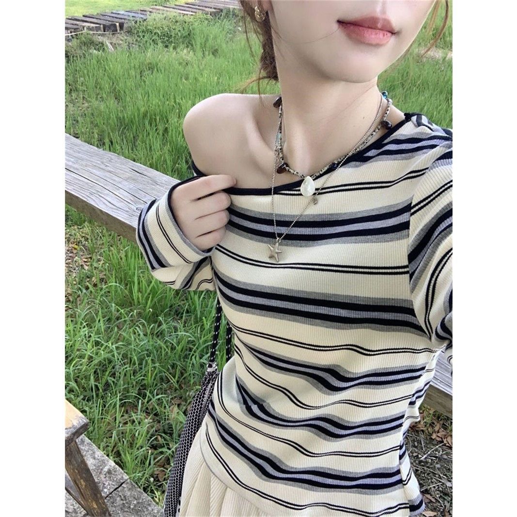 Ladies trendy long sleeve shirt with off-shoulder design and maritime stripe pattern Chic & Stil