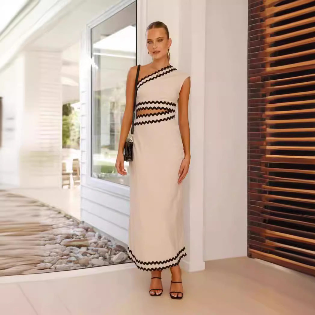 Ladies maxi dress with asymmetric cut and stylish cut-outs