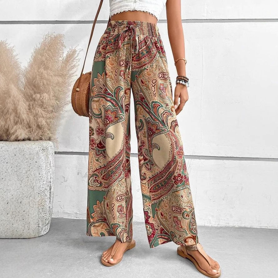 Wide Palazzo pants for women with paisley floral pattern and elastic waist Lune London