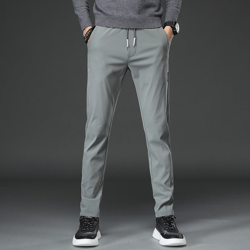 Men's slim fit sports pants with elastic waistband and practical zip pockets Lune London