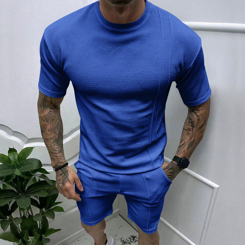 Men's short sleeve sports set with an innovative textured design and practical side pockets Lune London