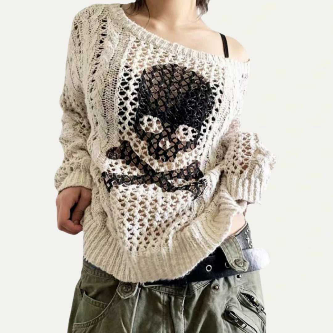 Oversized knit sweater for women with a creative hole pattern and a chic anchor design