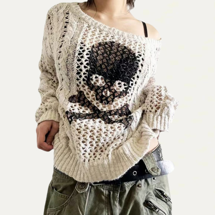 Oversized knit sweater for women with a creative hole pattern and a chic anchor design