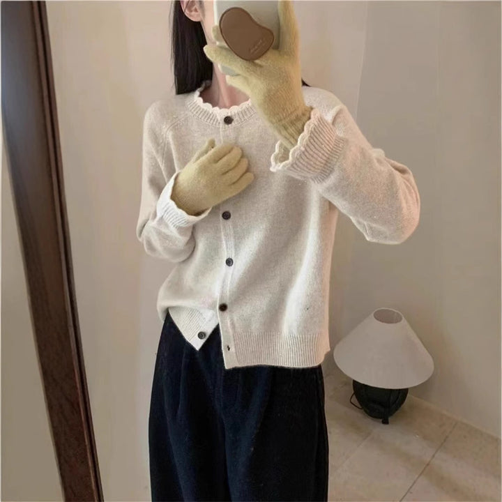 Ladies cozy knit cardigan with ribbed detail and button closure Lune London